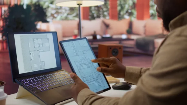 Headquarters relocation planning with office blueprint and workplace design discussion